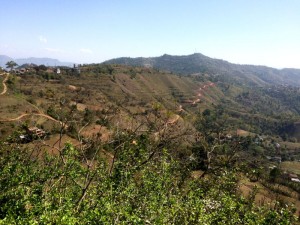 Looking out over the Tansen valley and one of the roads in, with the Himalayas in the background.