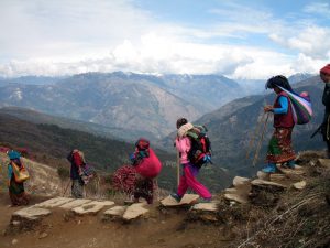 Nepali women carrying loads.