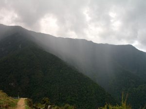 A storm across the valley, just before Chumrong.