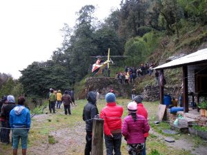 Airlifting a porter's body.