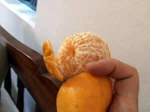 An orange colored orange.