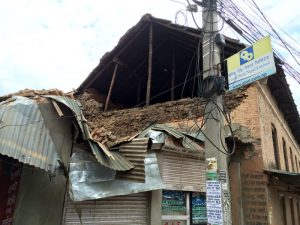 The upper floor collapsed onto the roof below.