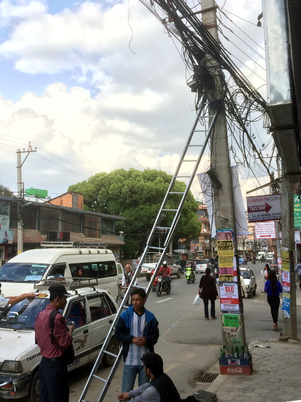 Utility linesmen at work.